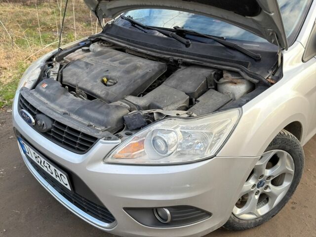 Сірий Форд Фокус, об'ємом двигуна 2 л та пробігом 404 тис. км за 5900 $, фото 22 на Automoto.ua