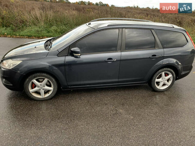 Сірий Форд Фокус, об'ємом двигуна 2 л та пробігом 211 тис. км за 6400 $, фото 5 на Automoto.ua