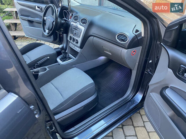 Серый Форд Фокус, объемом двигателя 1.8 л и пробегом 287 тыс. км за 5200 $, фото 16 на Automoto.ua