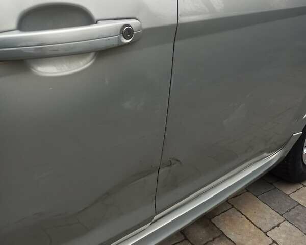 Серый Форд Фокус, объемом двигателя 1.6 л и пробегом 341 тыс. км за 4000 $, фото 7 на Automoto.ua