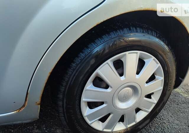 Серый Форд Фокус, объемом двигателя 1.6 л и пробегом 300 тыс. км за 5500 $, фото 18 на Automoto.ua