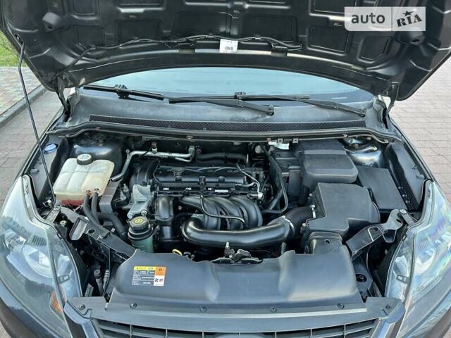Сірий Форд Фокус, об'ємом двигуна 1.6 л та пробігом 205 тис. км за 6850 $, фото 149 на Automoto.ua