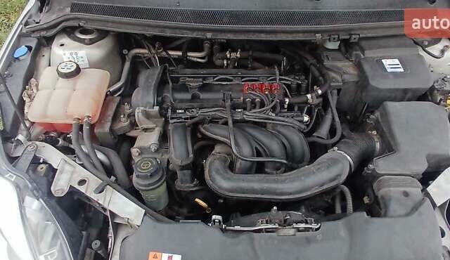 Серый Форд Фокус, объемом двигателя 1.6 л и пробегом 242 тыс. км за 5900 $, фото 14 на Automoto.ua