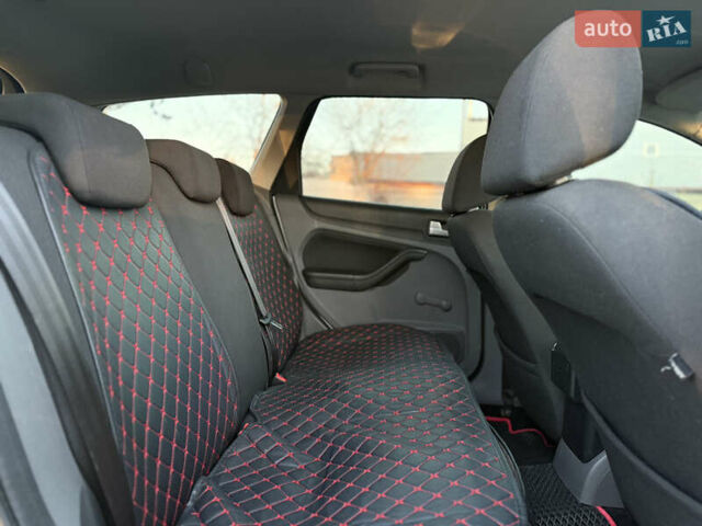 Серый Форд Фокус, объемом двигателя 1.8 л и пробегом 266 тыс. км за 5300 $, фото 22 на Automoto.ua