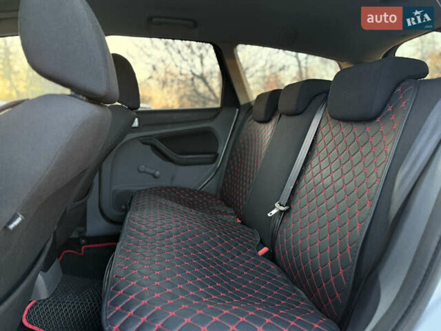 Серый Форд Фокус, объемом двигателя 1.8 л и пробегом 266 тыс. км за 5300 $, фото 18 на Automoto.ua