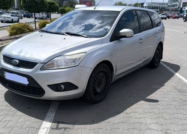 Серый Форд Фокус, объемом двигателя 1.6 л и пробегом 325 тыс. км за 3300 $, фото 1 на Automoto.ua