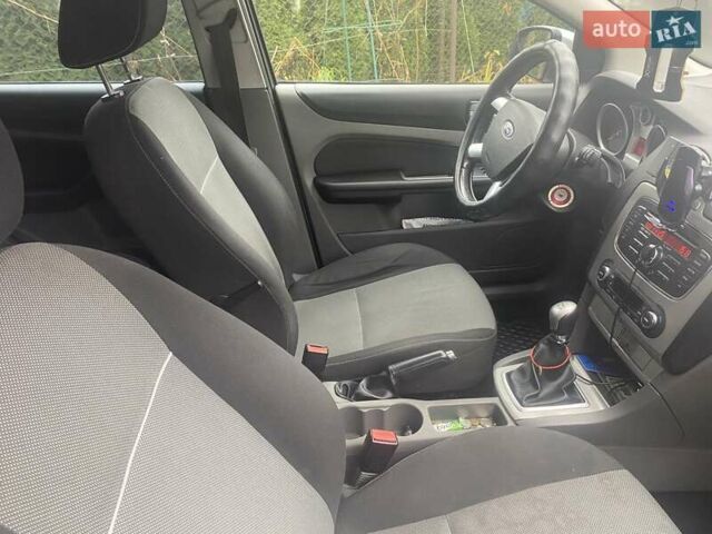 Серый Форд Фокус, объемом двигателя 1.8 л и пробегом 299 тыс. км за 6900 $, фото 18 на Automoto.ua