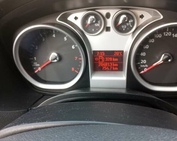 Серый Форд Фокус, объемом двигателя 1.6 л и пробегом 205 тыс. км за 6442 $, фото 6 на Automoto.ua