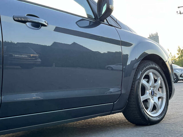 Сірий Форд Фокус, об'ємом двигуна 1.6 л та пробігом 205 тис. км за 6499 $, фото 71 на Automoto.ua