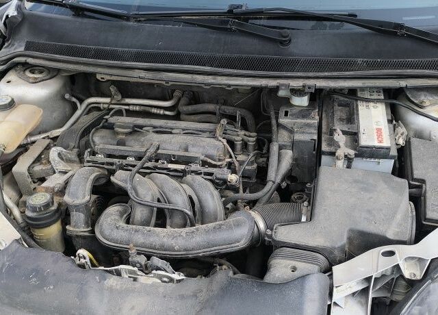 Серый Форд Фокус, объемом двигателя 1.6 л и пробегом 325 тыс. км за 3300 $, фото 7 на Automoto.ua