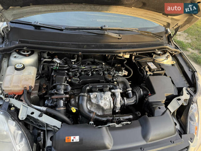 Серый Форд Фокус, объемом двигателя 1.6 л и пробегом 230 тыс. км за 4650 $, фото 16 на Automoto.ua