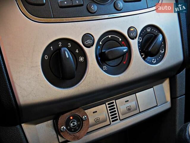 Серый Форд Фокус, объемом двигателя 1.6 л и пробегом 253 тыс. км за 5100 $, фото 11 на Automoto.ua