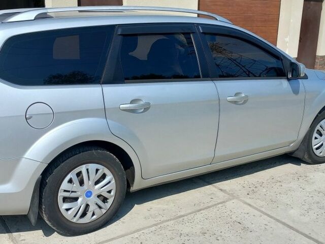 Серый Форд Фокус, объемом двигателя 1.6 л и пробегом 328 тыс. км за 6000 $, фото 5 на Automoto.ua