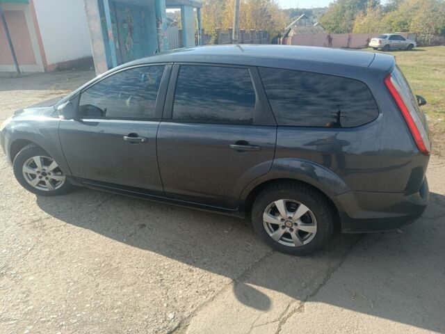 Серый Форд Фокус, объемом двигателя 1.6 л и пробегом 296 тыс. км за 5035 $, фото 5 на Automoto.ua