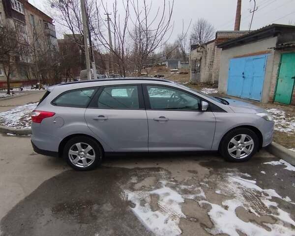 Серый Форд Фокус, объемом двигателя 1.6 л и пробегом 136 тыс. км за 7500 $, фото 2 на Automoto.ua