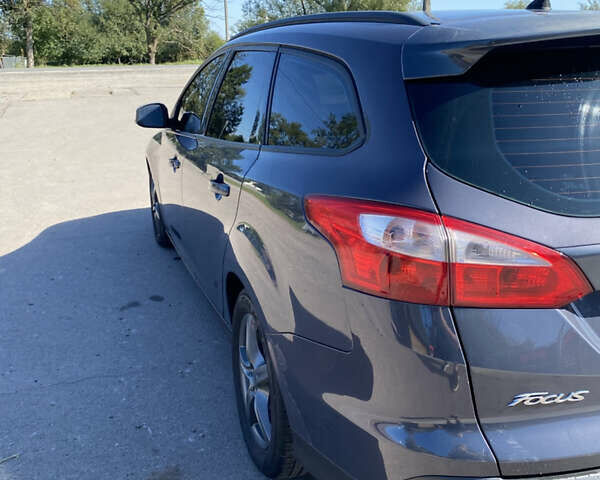 Серый Форд Фокус, объемом двигателя 1.56 л и пробегом 283 тыс. км за 7000 $, фото 6 на Automoto.ua