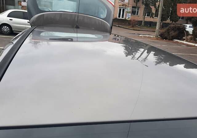 Серый Форд Фокус, объемом двигателя 2 л и пробегом 296 тыс. км за 7500 $, фото 19 на Automoto.ua