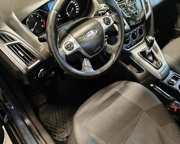 Серый Форд Фокус, объемом двигателя 1.6 л и пробегом 193 тыс. км за 7350 $, фото 13 на Automoto.ua