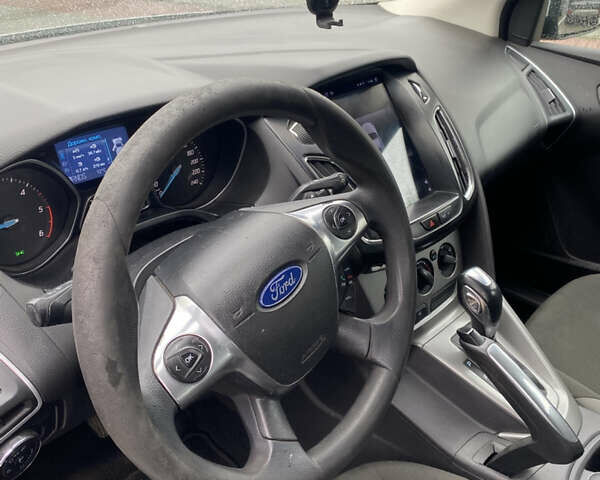 Серый Форд Фокус, объемом двигателя 2.01 л и пробегом 269 тыс. км за 6500 $, фото 12 на Automoto.ua