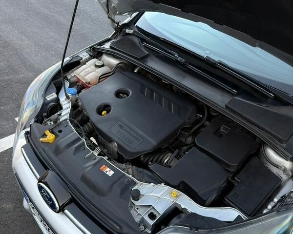 Сірий Форд Фокус, об'ємом двигуна 1.56 л та пробігом 210 тис. км за 8700 $, фото 72 на Automoto.ua