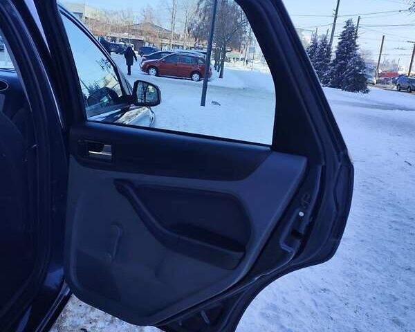 Сірий Форд Фокус, об'ємом двигуна 1.6 л та пробігом 246 тис. км за 6000 $, фото 23 на Automoto.ua