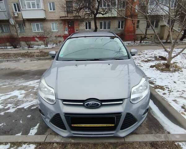 Серый Форд Фокус, объемом двигателя 1.6 л и пробегом 136 тыс. км за 7500 $, фото 5 на Automoto.ua