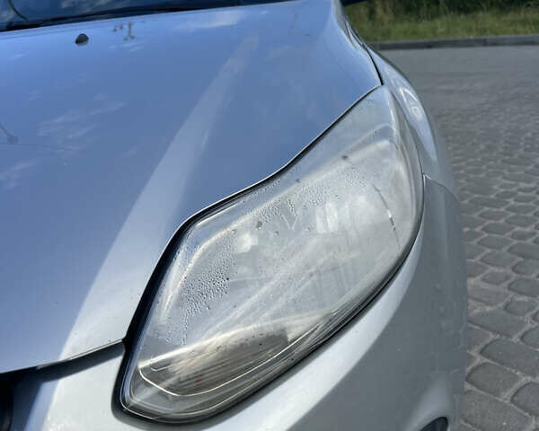 Серый Форд Фокус, объемом двигателя 1.56 л и пробегом 254 тыс. км за 7300 $, фото 1 на Automoto.ua