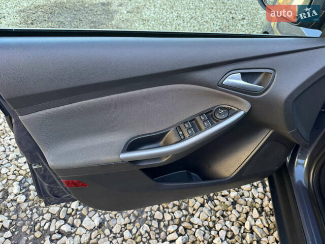 Сірий Форд Фокус, об'ємом двигуна 1.6 л та пробігом 203 тис. км за 6600 $, фото 22 на Automoto.ua