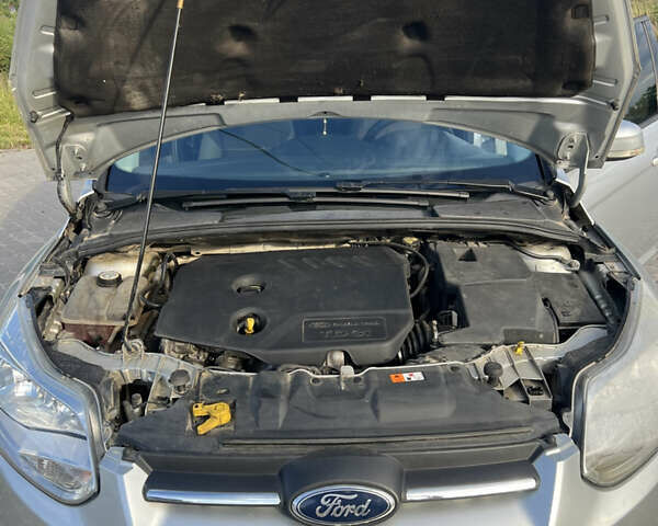 Серый Форд Фокус, объемом двигателя 1.56 л и пробегом 254 тыс. км за 7300 $, фото 12 на Automoto.ua