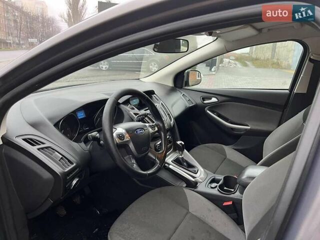 Серый Форд Фокус, объемом двигателя 1.6 л и пробегом 295 тыс. км за 7500 $, фото 5 на Automoto.ua