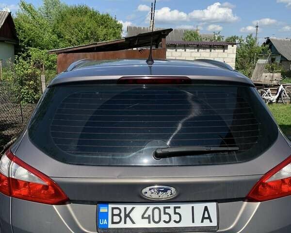Сірий Форд Фокус, об'ємом двигуна 1.56 л та пробігом 242 тис. км за 7300 $, фото 1 на Automoto.ua