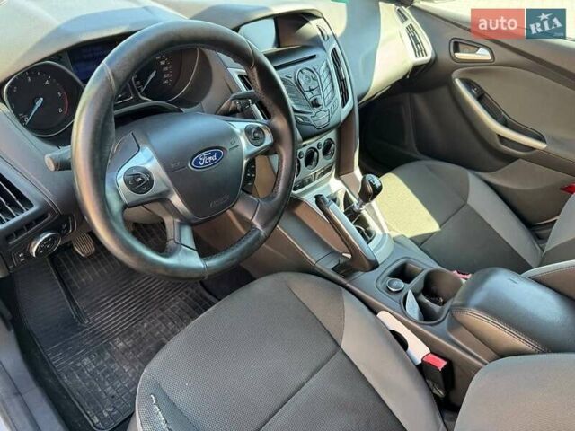 Серый Форд Фокус, объемом двигателя 1.56 л и пробегом 310 тыс. км за 6800 $, фото 7 на Automoto.ua