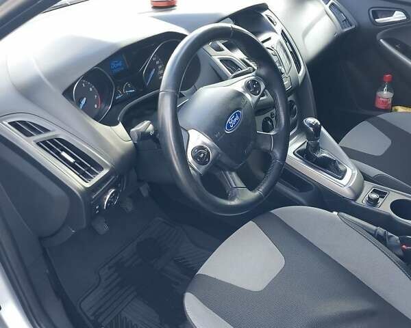 Серый Форд Фокус, объемом двигателя 1.6 л и пробегом 233 тыс. км за 6600 $, фото 5 на Automoto.ua