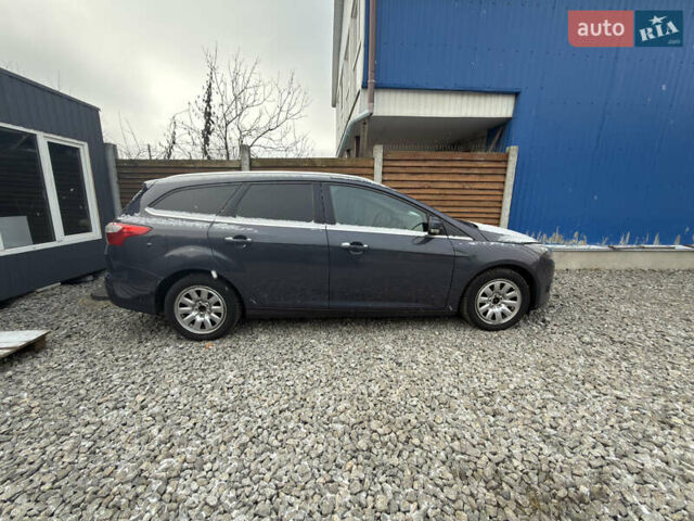 Серый Форд Фокус, объемом двигателя 1.6 л и пробегом 180 тыс. км за 2999 $, фото 4 на Automoto.ua