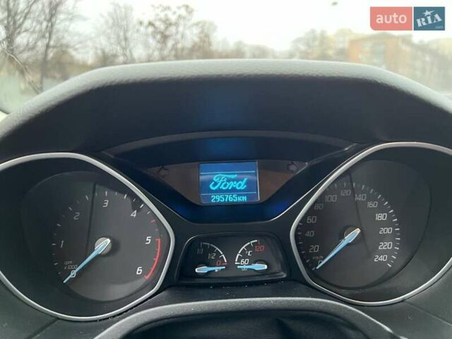 Серый Форд Фокус, объемом двигателя 1.6 л и пробегом 295 тыс. км за 7500 $, фото 7 на Automoto.ua