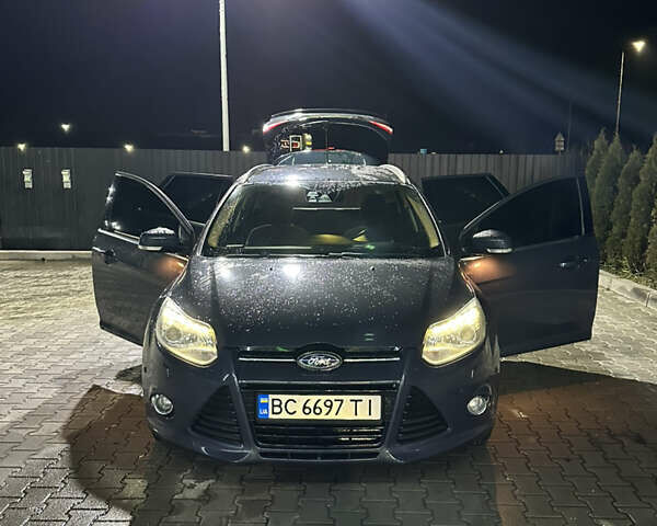 Серый Форд Фокус, объемом двигателя 1.6 л и пробегом 322 тыс. км за 8500 $, фото 6 на Automoto.ua