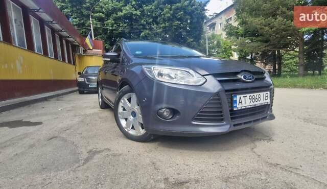 Сірий Форд Фокус, об'ємом двигуна 2 л та пробігом 275 тис. км за 8199 $, фото 4 на Automoto.ua