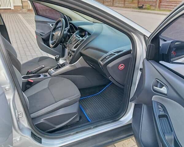 Сірий Форд Фокус, об'ємом двигуна 1.56 л та пробігом 262 тис. км за 7750 $, фото 11 на Automoto.ua