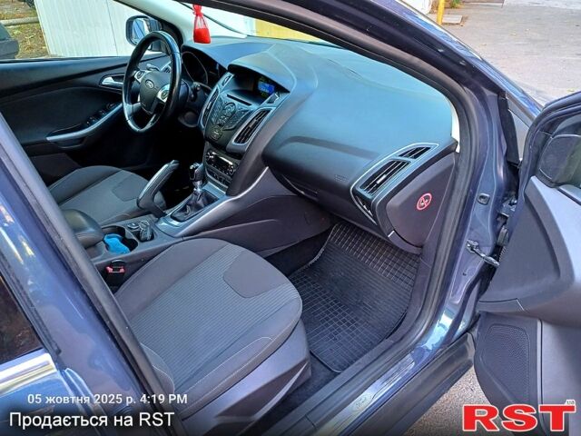 Серый Форд Фокус, объемом двигателя 1.6 л и пробегом 220 тыс. км за 7700 $, фото 6 на Automoto.ua