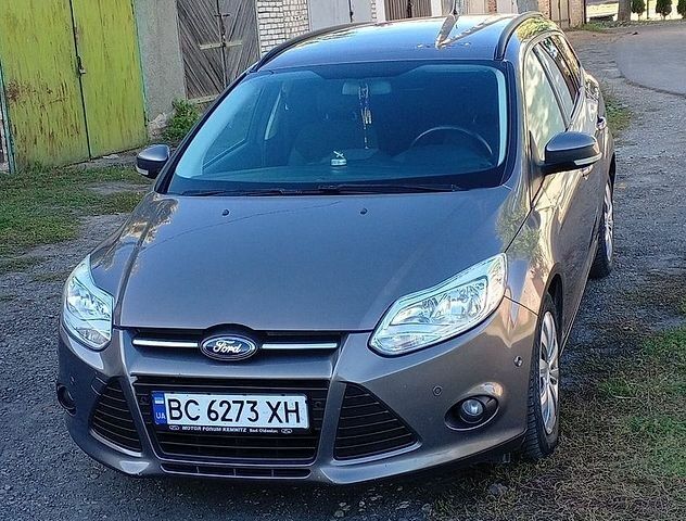 Сірий Форд Фокус, об'ємом двигуна 1.56 л та пробігом 245 тис. км за 6700 $, фото 5 на Automoto.ua