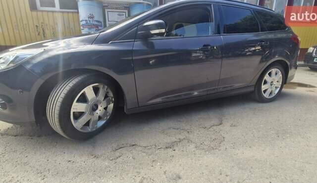 Сірий Форд Фокус, об'ємом двигуна 2 л та пробігом 275 тис. км за 8199 $, фото 2 на Automoto.ua