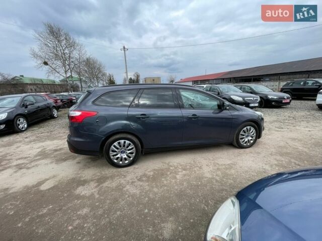 Сірий Форд Фокус, об'ємом двигуна 1.6 л та пробігом 235 тис. км за 6950 $, фото 7 на Automoto.ua