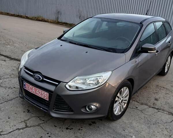 Серый Форд Фокус, объемом двигателя 1.6 л и пробегом 237 тыс. км за 7800 $, фото 1 на Automoto.ua