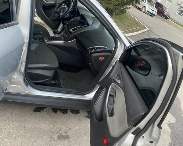 Сірий Форд Фокус, об'ємом двигуна 1.56 л та пробігом 243 тис. км за 7300 $, фото 21 на Automoto.ua