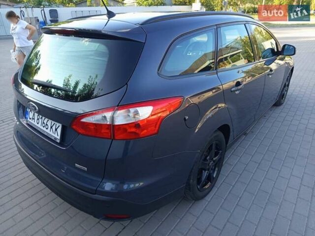 Серый Форд Фокус, объемом двигателя 1.56 л и пробегом 240 тыс. км за 7500 $, фото 7 на Automoto.ua