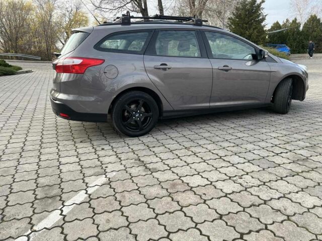 Сірий Форд Фокус, об'ємом двигуна 1 л та пробігом 213 тис. км за 6600 $, фото 12 на Automoto.ua