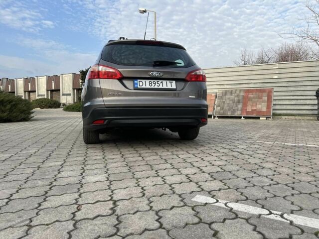 Сірий Форд Фокус, об'ємом двигуна 1 л та пробігом 213 тис. км за 6600 $, фото 9 на Automoto.ua