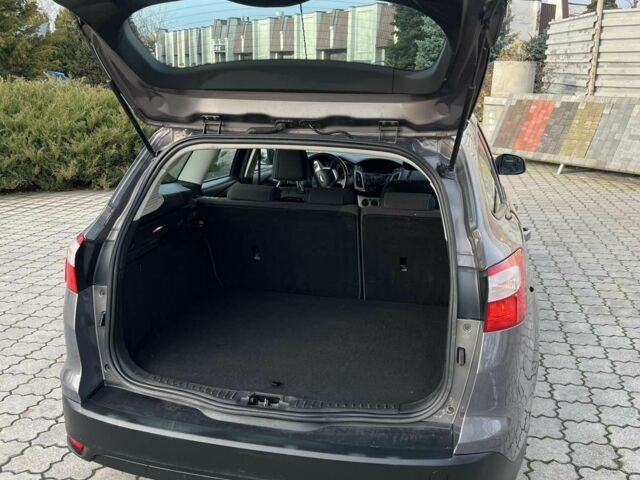Сірий Форд Фокус, об'ємом двигуна 1 л та пробігом 213 тис. км за 6600 $, фото 15 на Automoto.ua