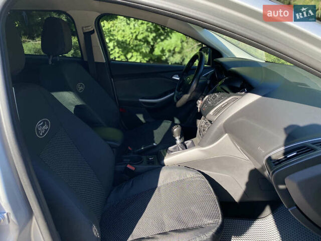 Форд Фокус 2013 у Києві на Automoto.ua Сірий Форд Фокус, об'ємом двигуна 1.6 л та пробігом 242 тис. км за 6990 $, фото 22 на Automoto.ua