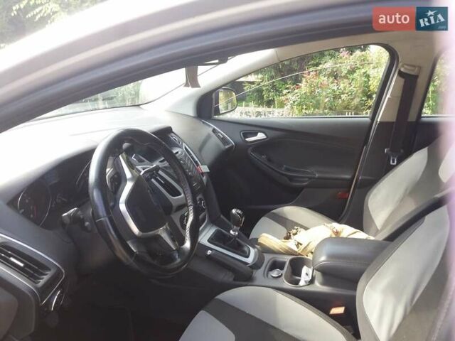 Серый Форд Фокус, объемом двигателя 1 л и пробегом 300 тыс. км за 7333 $, фото 10 на Automoto.ua